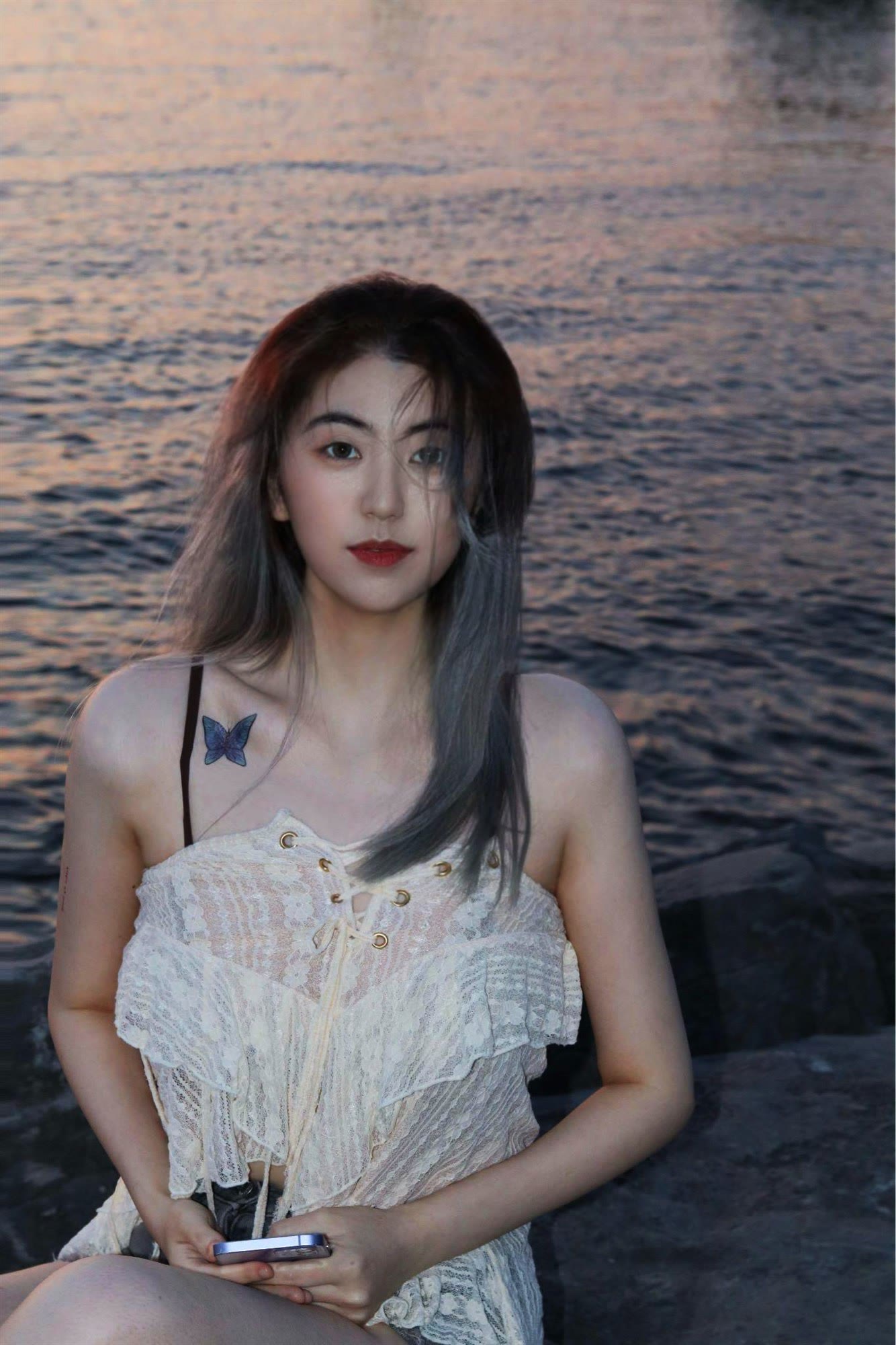 Editorial portrait beside the water at blue hour in Ottawa